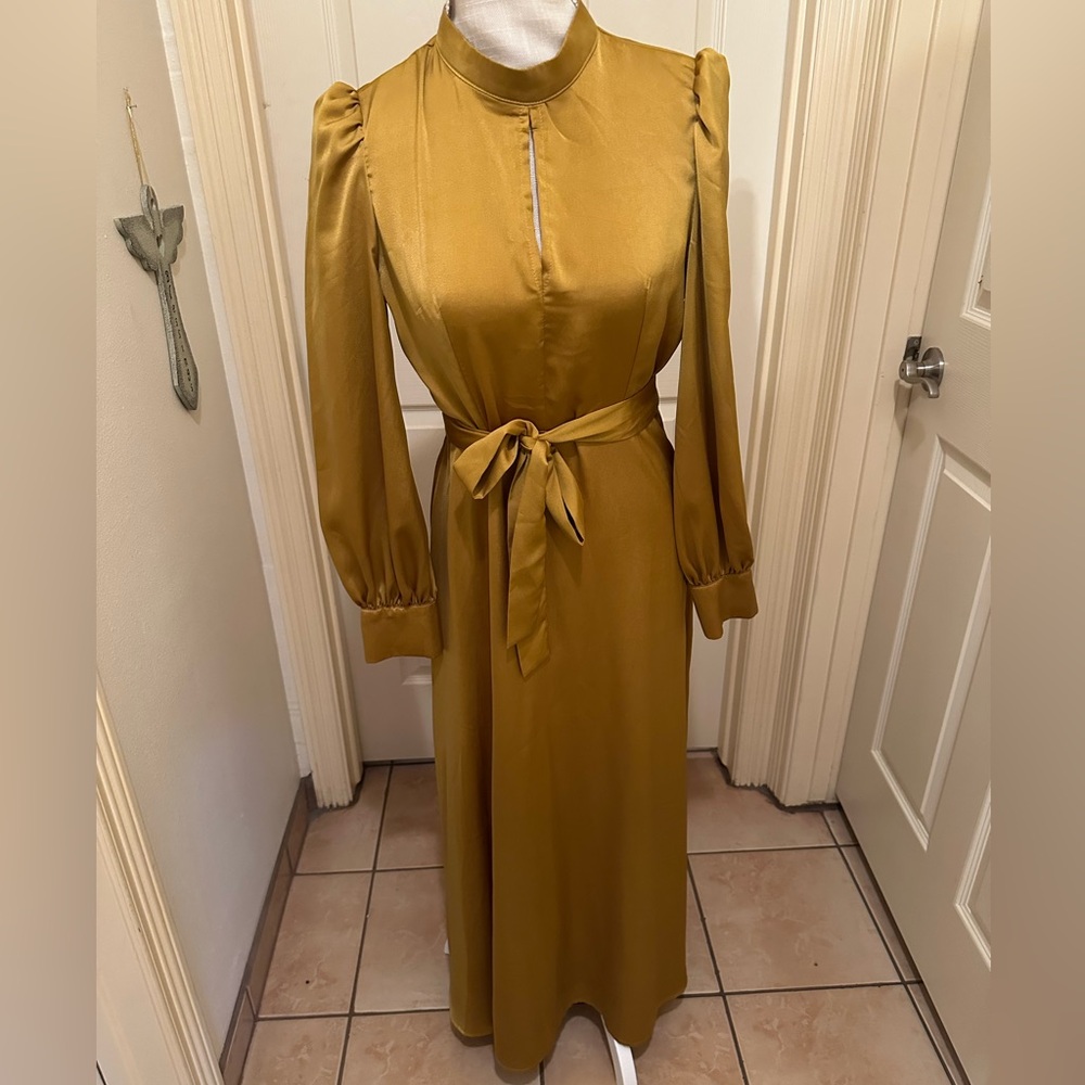 Women’s long, gold dress